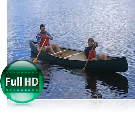 Photo of a dad and son canoeing with the Full HD video icon showing video capabilities