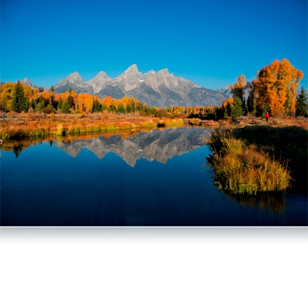 Landscape photo of a mountain range and its reflection